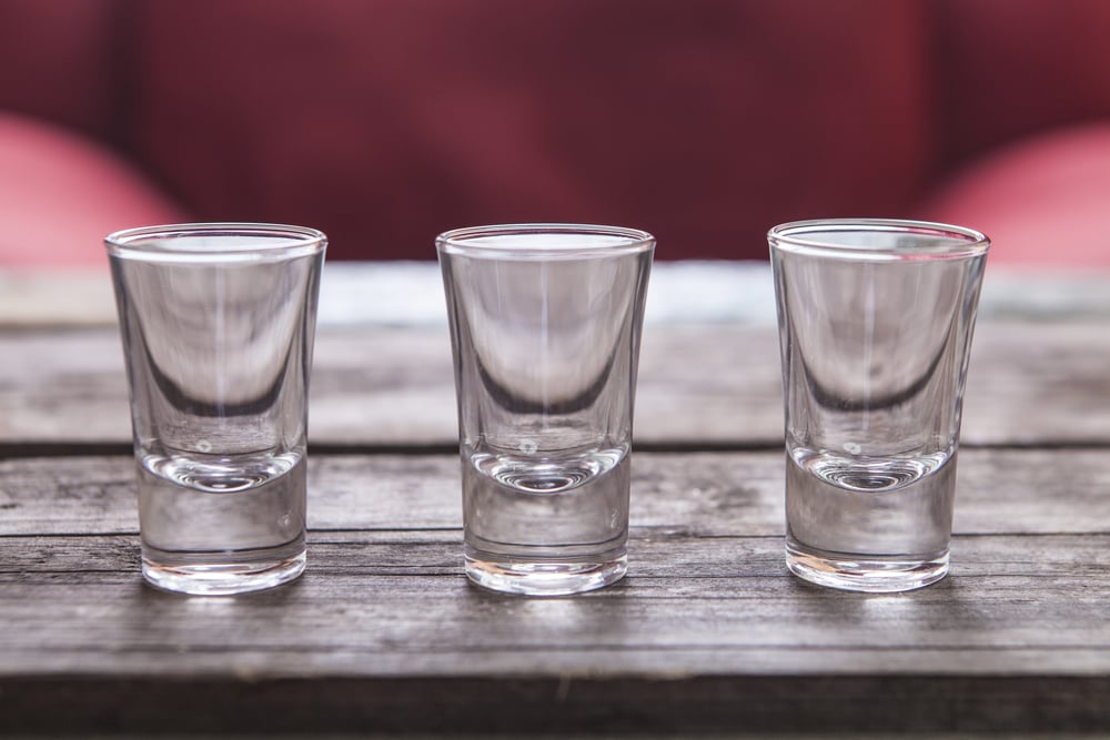 three shot glasses